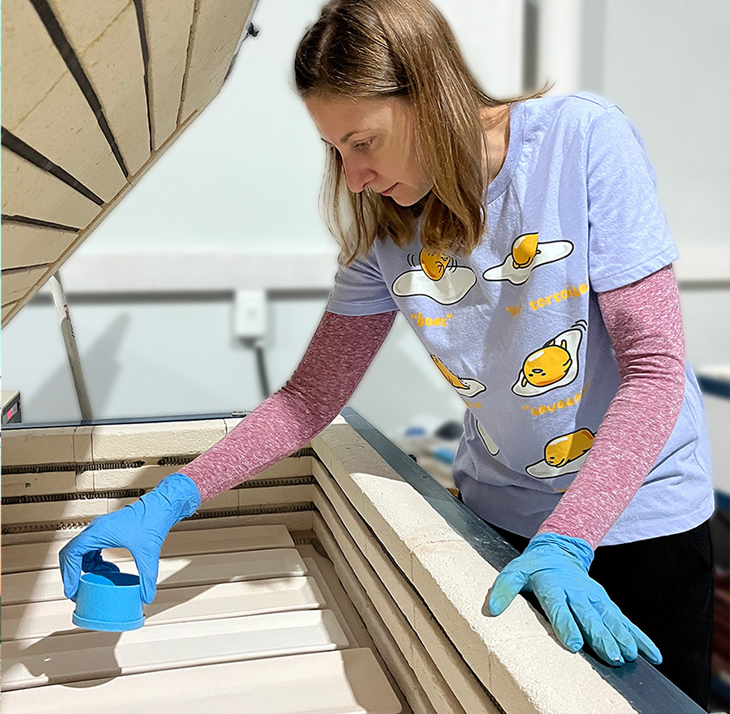 A Fanglasstic Artisan prepping a glass fusing kiln.